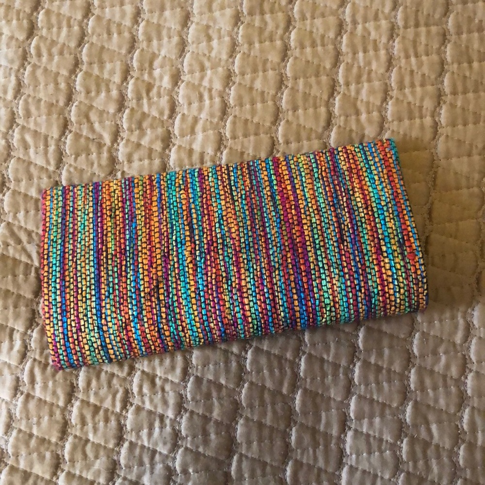 NWOT RAINBOW FABRIC CLUTCH PINK INTERIOR